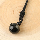 collier boule pierre
