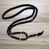 collier homme oeil de protection