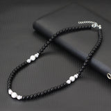 collier perle blanche homme​