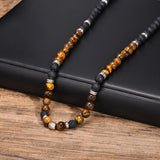 collier perle oeil de tigre homme