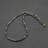 collier perle ras du cou​